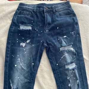 NWOT Distressed dark blue jeans